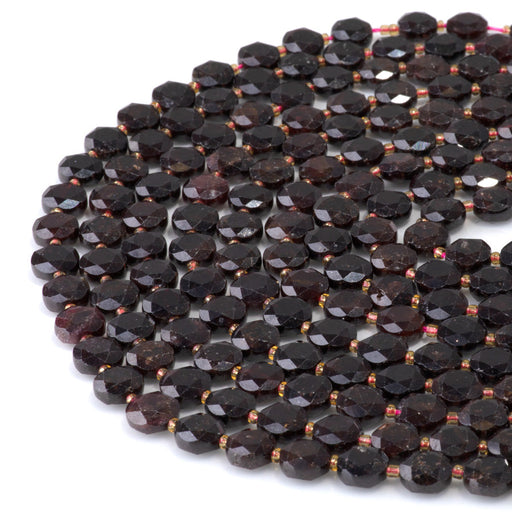 This is a Dakota Stones 8mm Red Garnet Cut Gemstone strand with coin star beads in 15-16 inch strand.