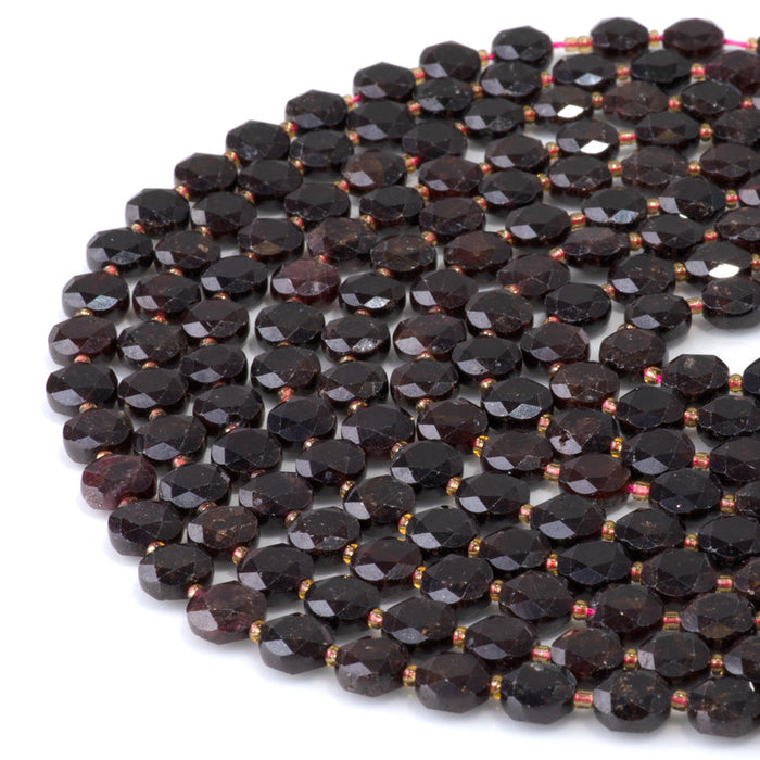 This is a Dakota Stones 8mm Red Garnet Cut Gemstone strand with coin star beads in 15-16 inch strand.