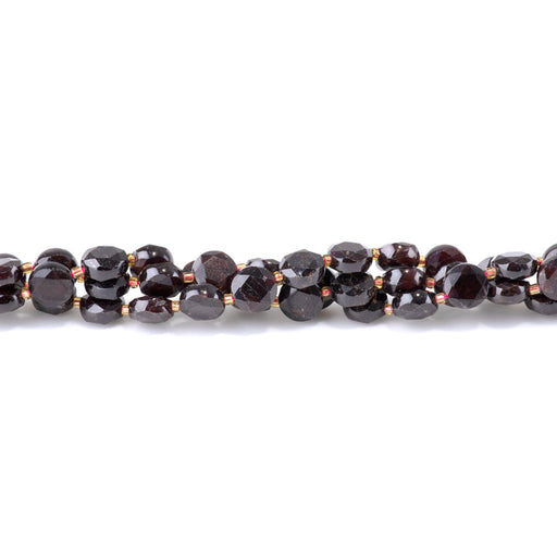 This is a Dakota Stones 8mm Red Garnet Cut Gemstone strand with coin star beads in 15-16 inch strand.