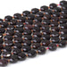This is a Dakota Stones 8mm Red Garnet Cut Gemstone strand with coin star beads in 15-16 inch strand.