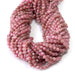 This is a Dakota Stones 4mm Rhodonite Gemstone strand with AA grade faceted round beads in 15-16 inch strand.