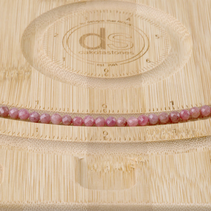 This is a Dakota Stones 4mm Rhodonite Gemstone strand with AA grade faceted round beads in 15-16 inch strand.