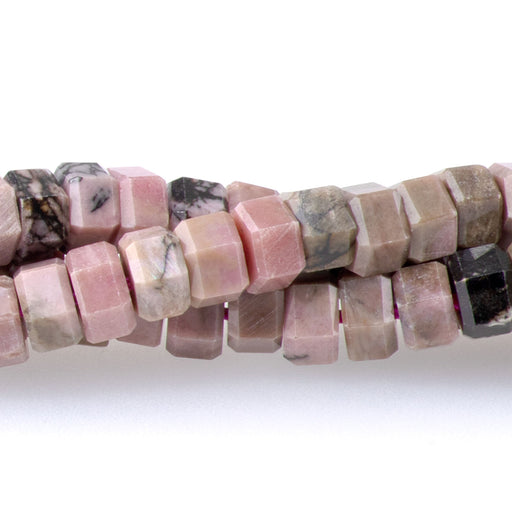 This is a Dakota Stones 6mm Rhodonite Matrix Hexagon Gemstone strand of round beads in 15-16 inch strand.