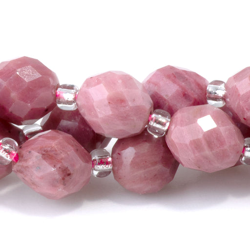 This is a Dakota Stones 7x8mm Rhodonite Rice Gemstone strand with A grade faceted beads in 15-16 inch strand.