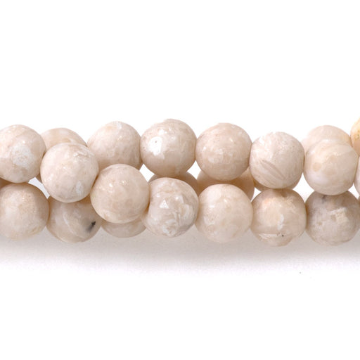 This is a Dakota Stones 4mm River Stone Gemstone strand with matte round beads in 15-16 inch strand.