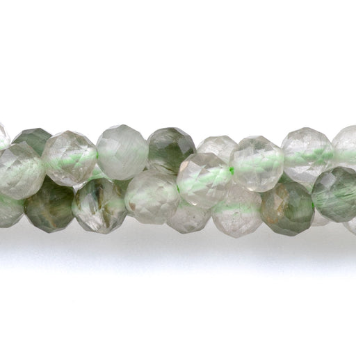 This is a Dakota Stones 4mm Green Rutilated Quartz Microfaceted Gemstone strand with round beads in 15-16 inch strand.