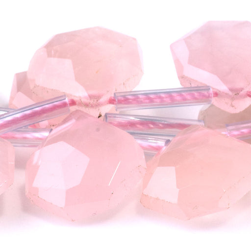 This is a Dakota Stones 13x15mm Rose Quartz Gemstone strand with faceted irregular tear drop beads in 15-16 inch strand.
