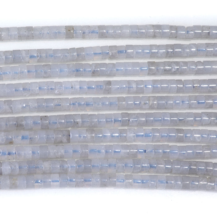 This is a Dakota Stones 2x4mm Blue Rose Quartz Gemstone strand with heishi beads in 15-16 inch strand.