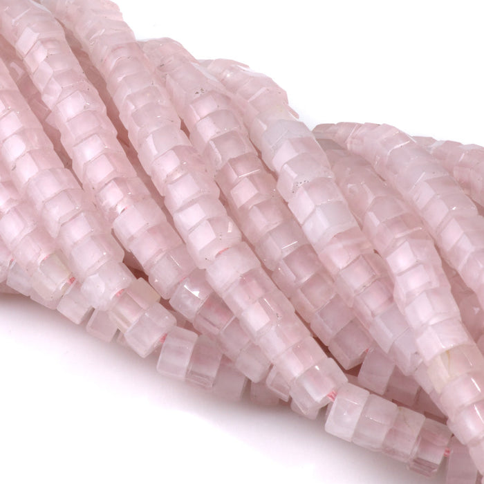 This is a Dakota Stones 6mm Rose Quartz Large Hole Gemstone strand with faceted hexagon beads in 8 inch strand.