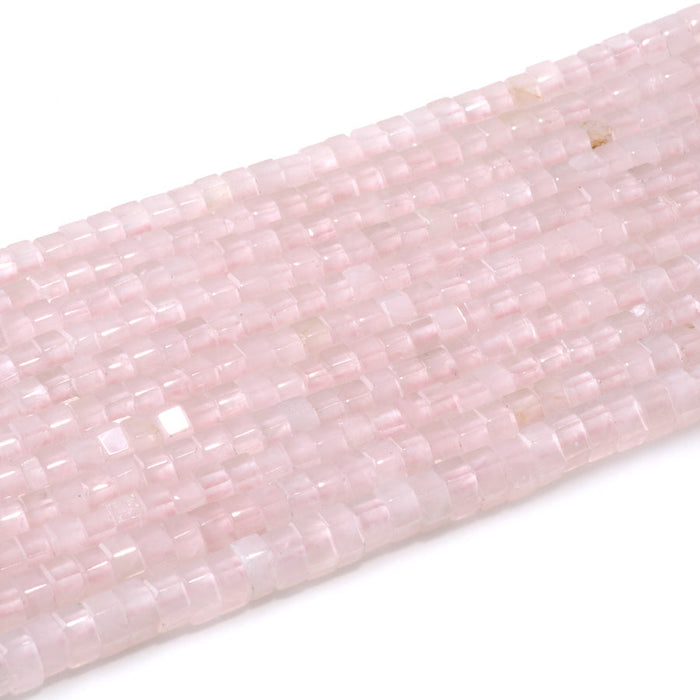 This is a Dakota Stones 6mm Rose Quartz Large Hole Gemstone strand with faceted hexagon beads in 8 inch strand.