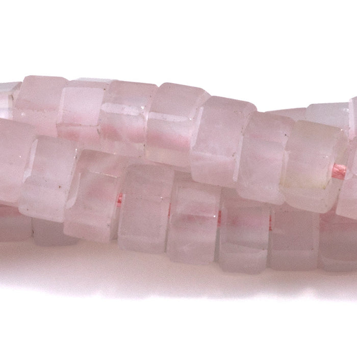 This is a Dakota Stones 6mm Rose Quartz Large Hole Gemstone strand with faceted hexagon beads in 8 inch strand.