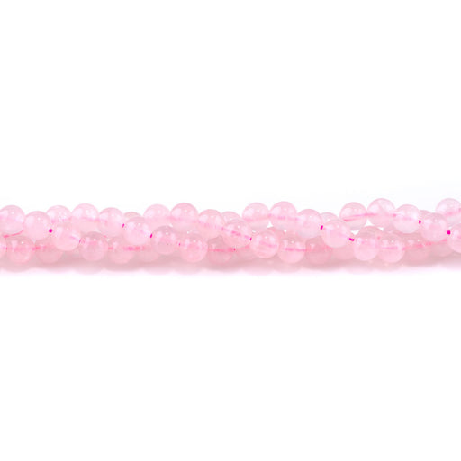 This is a Dakota Stones 6mm Rose Quartz Rounda Grade Gemstone strand of round beads in 15-16 inch strand.