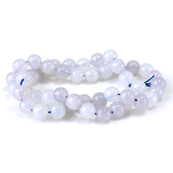 This is a Dakota Stones 8mm Blue Rose Quartz Gemstone strand with round beads in 15-16 inch strand.