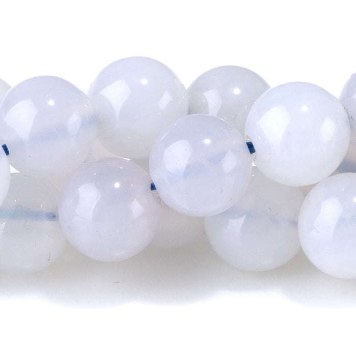 This is a Dakota Stones 8mm Blue Rose Quartz Gemstone strand with round beads in 15-16 inch strand.