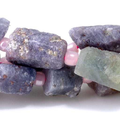 This is a Dakota Stones 8x12mm Ruby Sapphire Tube Gemstone strand with A grade rough beads in 15-16 inch strand.