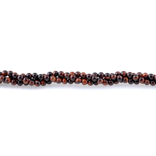 This is a Dakota Stones 4mm Red Tiger Eye Gemstone strand with round beads in 15-16 inch strand.