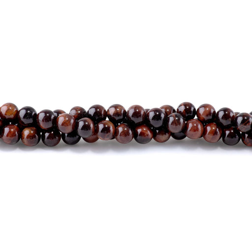 This is a Dakota Stones 8mm Red Tiger Eye Gemstone strand with round beads in 15-16 inch strand.
