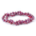 This is a Dakota Stones 6mm Ruby Gemstone strand with AAA grade round beads in 15-16 inch strand.