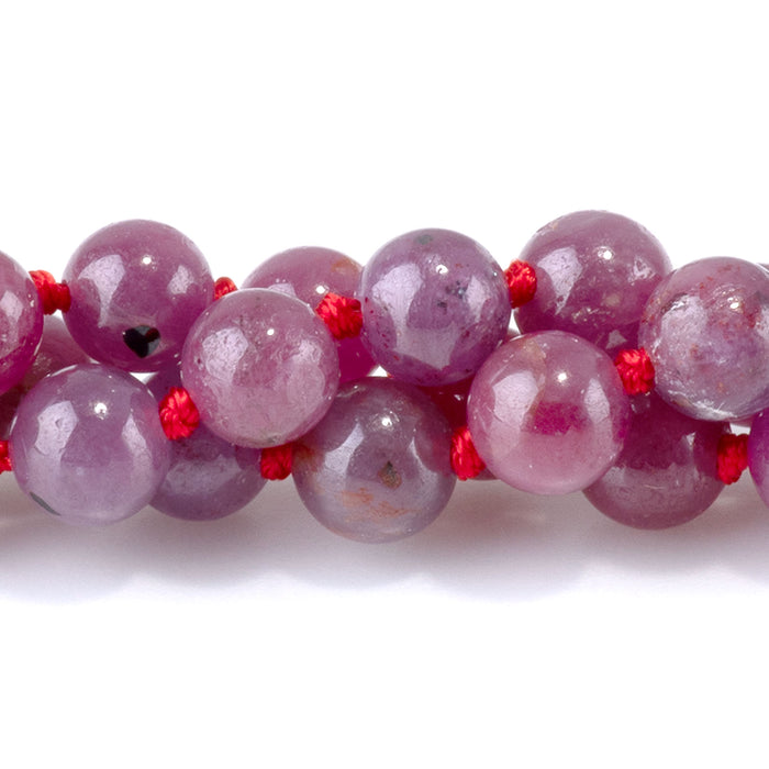 This is a Dakota Stones 6mm Ruby Gemstone strand with AAA grade round beads in 15-16 inch strand.