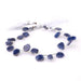 This is a Dakota Stones 10x12-13x15mm Sapphire Slice Gemstone strand with irregular beads in 8 inch strand.