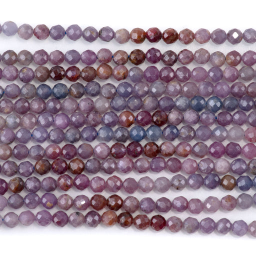 This is a Dakota Stones 4mm Sapphire Banded Purple Gemstone strand with A grade faceted round beads in 15-16 inch strand.