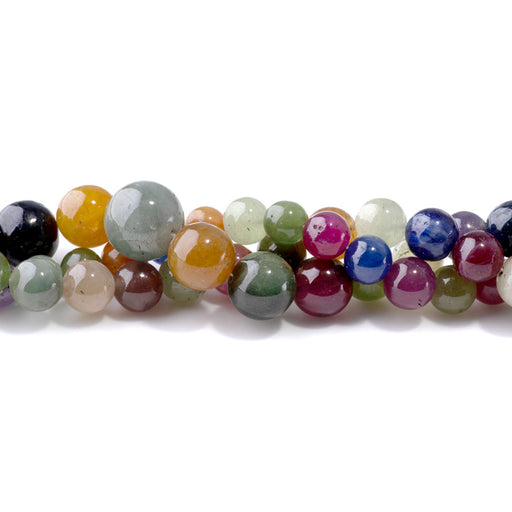 This is a Dakota Stones 8-16mm Fancy Sapphire Gemstone strand with round beads in 19-20 inch strand.