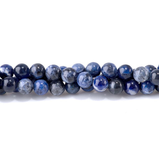 This is a Dakota Stones 10mm Sodalite Gemstone strand with round beads in 15-16 inch strand.