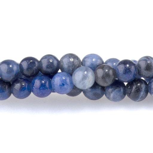 This is a Dakota Stones 4mm Sodalite Gemstone strand with round beads in 15-16 inch strand.