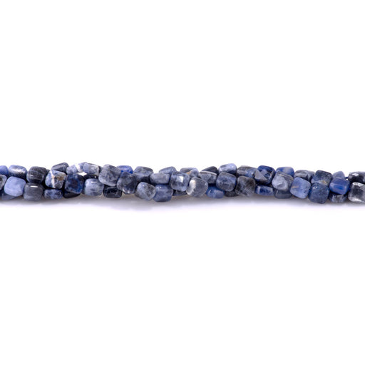 This is a Dakota Stones 6mm Sodalite Gemstone strand with faceted square beads in 15-16 inch strand.