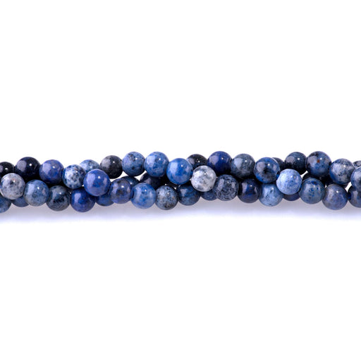 This is a Dakota Stones 6mm Sunset Dumortierite Large Hole Gemstone strand with round beads.