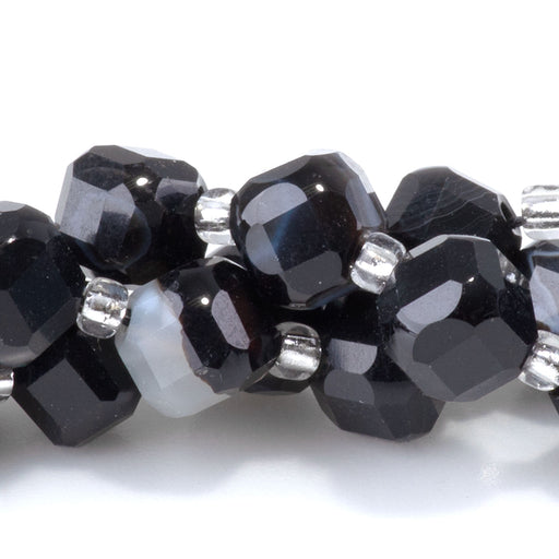 This is a Dakota Stones 6x8mm Black Sardonyx Corner Gemstone strand with table-cut cube beads in 15-16 inch strand.
