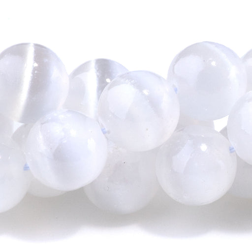 This is a Dakota Stones 10mm Selenite Gemstone strand with AA grade round beads in 15-16 inch strand.