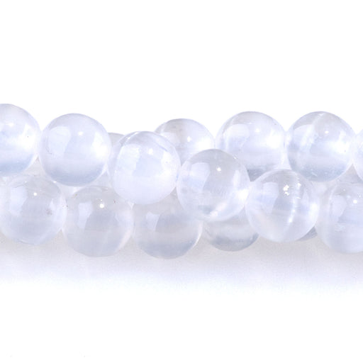 This is a Dakota Stones 6mm Selenite Gemstone strand with AA grade round beads in 15-16 inch strand.