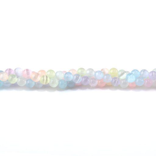 This is a Dakota Stones 6mm Selenite Pastel Rainbow Gemstone strand with dyed round beads in 15-16 inch strand.