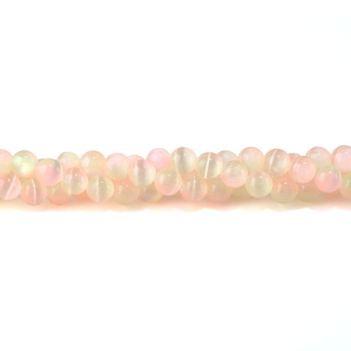 This is a Dakota Stones 8mm Selenite Lime Pink Gemstone strand with dyed round beads in 15-16 inch strand.