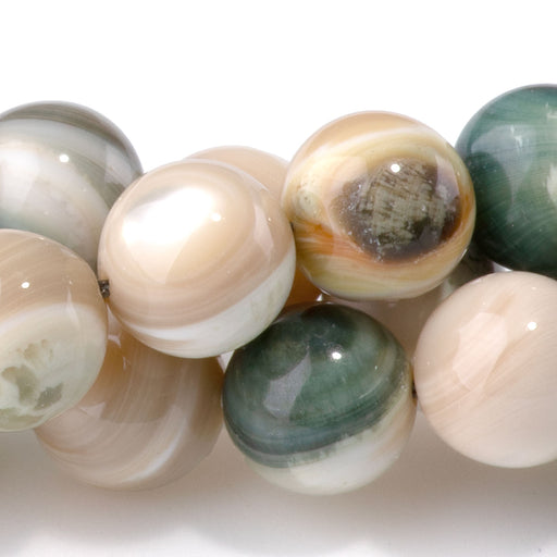 This is a Dakota Stones 10mm Green Turban Snail Gemstone strand with round beads in 15-16 inch strand.