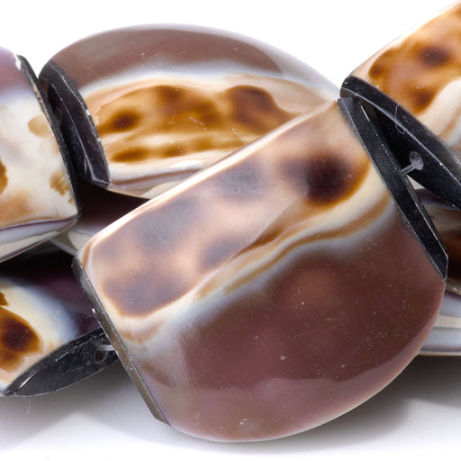 This is a Dakota Stones 25x30mm Tiger Cowrie Puff Tab Gemstone strand of round beads in 15-16 inch strand.