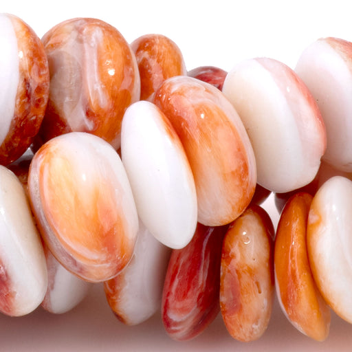 This is a Dakota Stones 12mm Spiny Oyster Gemstone strand with free-form rondelle beads in 15-16 inch strand.