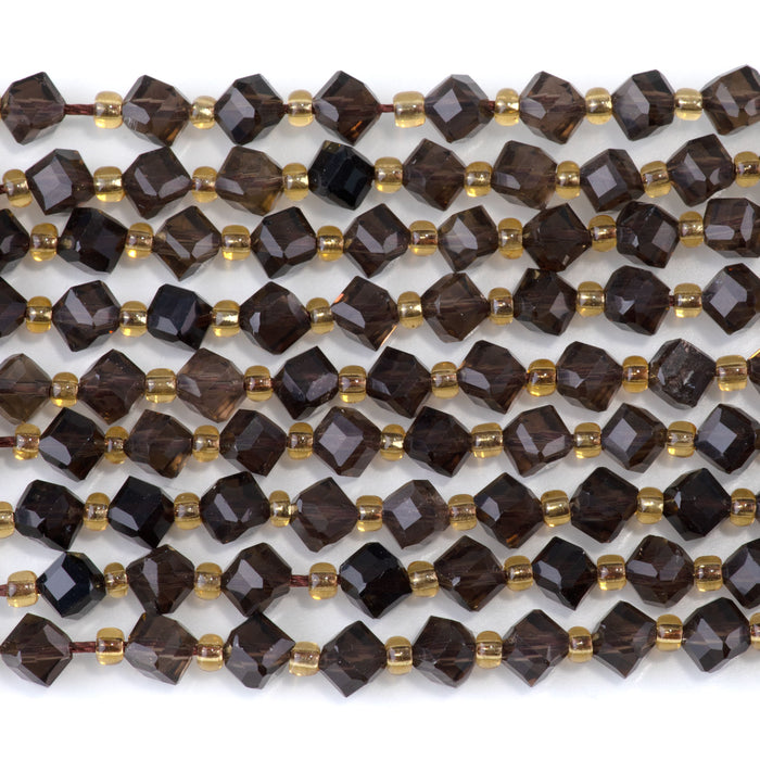 This is a Dakota Stones 4x6mm Smoky Quartz Corner Gemstone strand with table-cut cube beads in 15-16 inch strand.