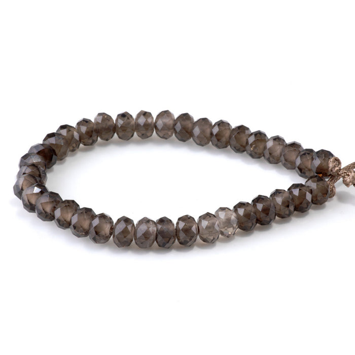This is a Dakota Stones 8mm Smoky Quartz Large Hole Gemstone strand with faceted rondelle beads in 8 inch strand.