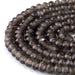 This is a Dakota Stones 8mm Smoky Quartz Large Hole Gemstone strand with faceted rondelle beads in 8 inch strand.
