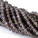 This is a Dakota Stones 8mm Smoky Quartz Large Hole Gemstone strand with faceted rondelle beads in 8 inch strand.