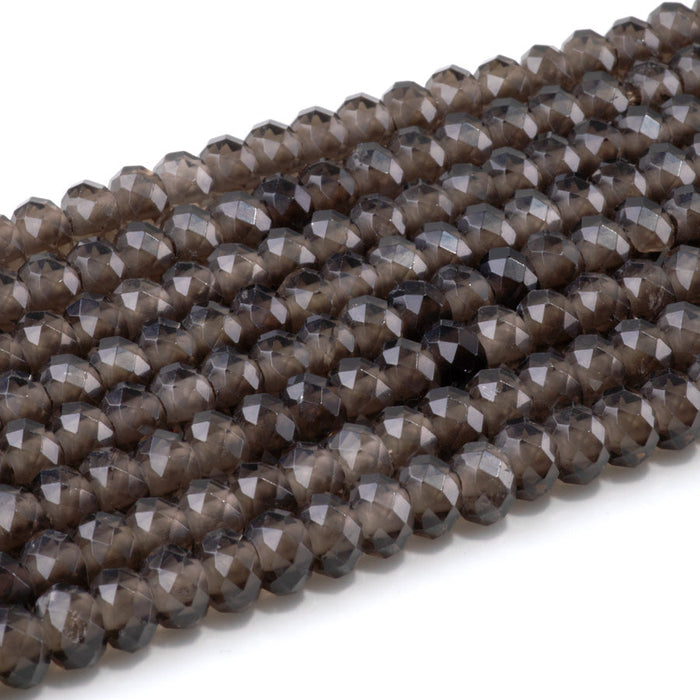 This is a Dakota Stones 8mm Smoky Quartz Large Hole Gemstone strand with faceted rondelle beads in 8 inch strand.