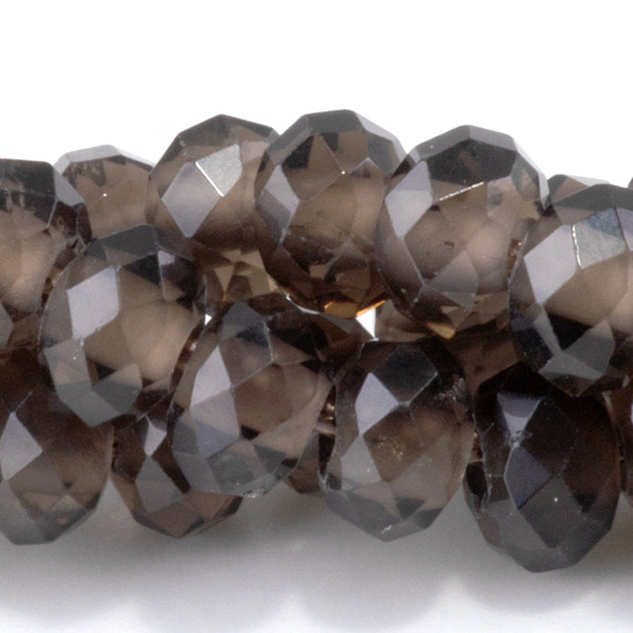 This is a Dakota Stones 8mm Smoky Quartz Large Hole Gemstone strand with faceted rondelle beads in 8 inch strand.