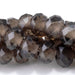 This is a Dakota Stones 8mm Smoky Quartz Large Hole Gemstone strand with faceted rondelle beads in 8 inch strand.