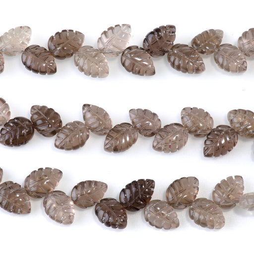This is a Dakota Stones 8x11mm Smoky Quartz Leaf Gemstone strand of round beads in 8 inch strand.