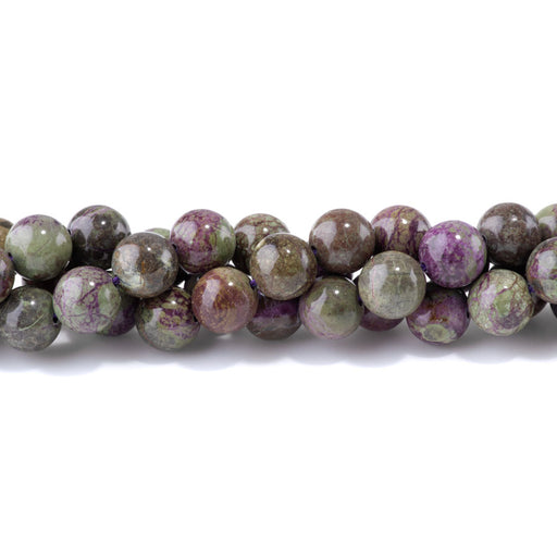 This is a Dakota Stones Atlantisite Stichtite Gemstone strand with round beads in 15-16 inch strand.