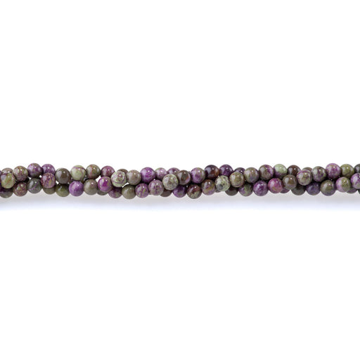 This is a Dakota Stones 4mm Atlantisite Stichtite Gemstone strand with round beads in 15-16 inch strand.