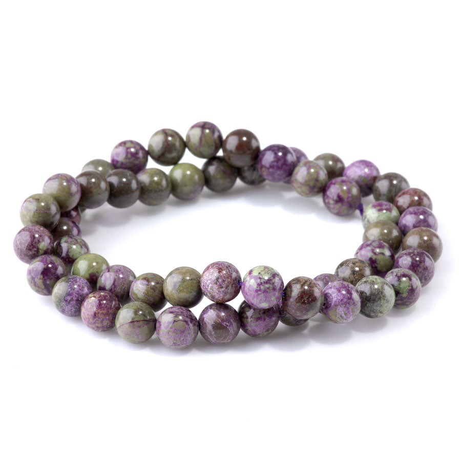 This is a Dakota Stones 8mm Atlantisite Stichtite Gemstone strand with round beads in 15-16 inch strand.