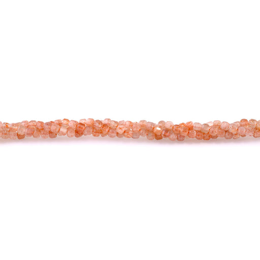 This is a Dakota Stones 3mm Golden Sunstone Gemstone strand with A grade table-cut cube beads in 15-16 inch strand.